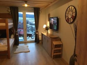 Postel nebo postele na pokoji v ubytování Apartmán u svahu Dolní Morava