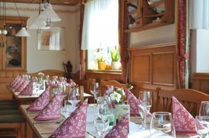 a long table with pink napkins on top of it at Landhotel Gafringwirt in Euratsfeld
