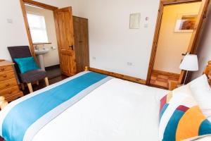 Letto o letti in una camera di Nellie Dee's - Room Only