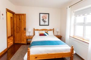 Letto o letti in una camera di Nellie Dee's - Room Only
