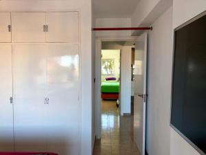 A bed or beds in a room at Apartamento Flamingo Puerto Marina - 150m Playa