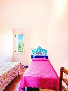 Postel nebo postele na pokoji v ubytování Orosei RE - Il Paradiso degli Ulivi con PISCINA e vista mare