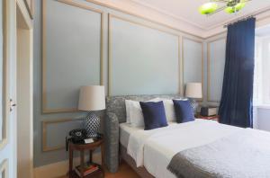 Cama ou camas em um quarto em Casa Oliver Boutique B&B - Principe Real