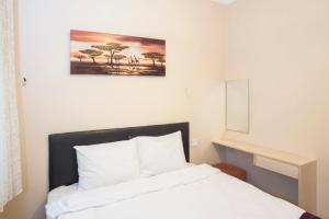 Postel nebo postele na pokoji v ubytování Berce Apartments