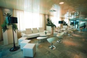Телевизор и/или развлекательный центр в Hotel Premier & Suites - Premier Resort