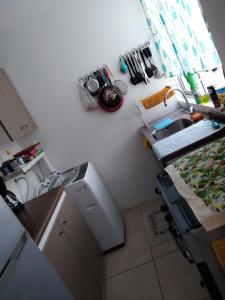 Una cocina o zona de cocina en Departamento La Serena