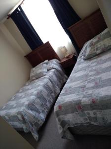 Cama o camas de una habitación en Departamento La Serena