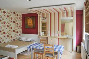 Posteľ alebo postele v izbe v ubytovaní Wood Creek Apartments