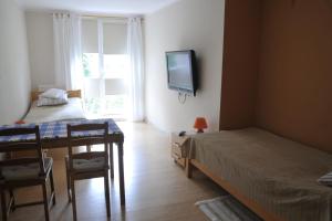 Posteľ alebo postele v izbe v ubytovaní Wood Creek Apartments