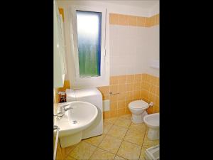 Koupelna v ubytování Residenze Mare e Pineta + 47 fotografií