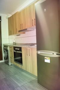 Kuchyňa alebo kuchynka v ubytovaní Sumergete en leon I y II vivienda turística