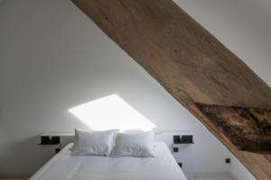Postel nebo postele na pokoji v ubytování B&B Amelhof