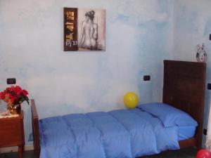Posteľ alebo postele v izbe v ubytovaní La Coccinella B&B