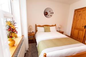 Letto o letti in una camera di Nellie Dee's - Room Only