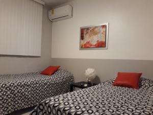 Katil atau katil-katil dalam bilik di Isla Verde Aptm
