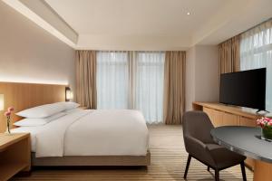 TV a/nebo společenská místnost v ubytování Hyatt Place Chengdu Pebble Walk