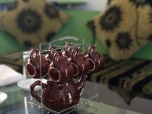 a chocolate model of a bug on a glass table at Thien Thanh Hotel in Vĩnh Long