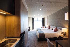 Afbeelding uit fotogalerij van Winery Hotel and Condominium HITOHANA in Furano