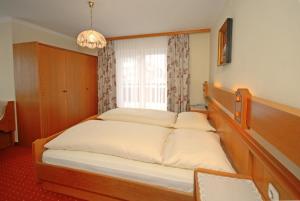Letto o letti in una camera di Pension Riedlsperger