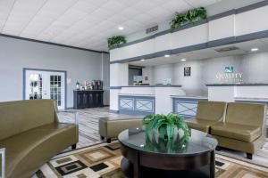 a waiting room with couches and a table at Quality Inn & Suites Brooksville I-75-Dade City in Ridge Manor