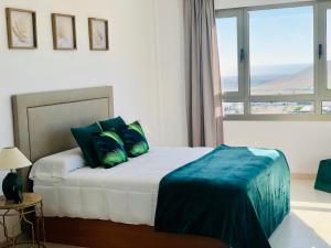 Posteľ alebo postele v izbe v ubytovaní Canaryislandshost l Infinity Views
