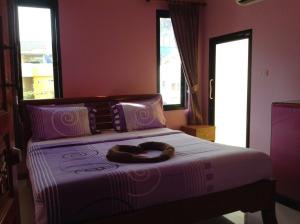 Letto o letti in una camera di Baan Mulan