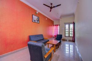 Posezení v ubytování Holidayincoorg Cozy Nest