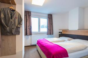 Postel nebo postele na pokoji v ubytování smartFLATS