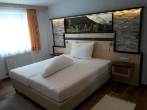 Cama o camas de una habitación en Gästeheim Sigrid