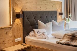 Łóżko lub łóżka w pokoju w obiekcie Viktoria Lodges