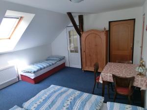 Tempat tidur dalam kamar di Privát Folprechtovi