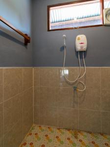 Vonios kambarys apgyvendinimo įstaigoje Dokchampa Guesthouse