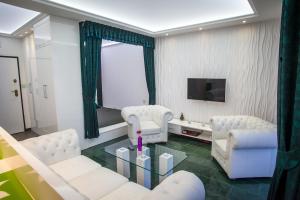 Posedenie v ubytovaní Royal Apartment in City Centre