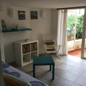 Posezení v ubytování Casetta in Riva al Mare