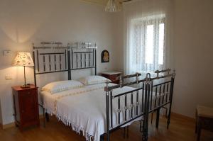 A bed or beds in a room at B&B La Casa Di Tocco