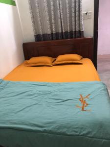 Postel nebo postele na pokoji v ubytování An Ngọc Linh Hotel