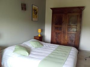 Postel nebo postele na pokoji v ubytování La Bastide de l'Oliveraie