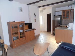 Kuchyň nebo kuchyňský kout v ubytování Apartments Febsis