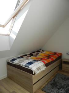 Postel nebo postele na pokoji v ubytování Garden Baltic