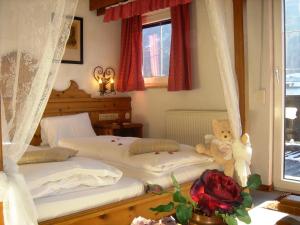 Posteľ alebo postele v izbe v ubytovaní Alp Art Hotel Götzens