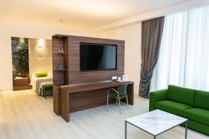 TV in/ali zabaviščno središče v nastanitvi Hotel Terme Venezia