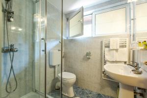 Koupelna v ubytování Hotel Herastrau