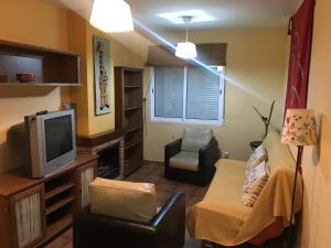 A television and/or entertainment centre at Vivienda Chorrillos del Lavadero