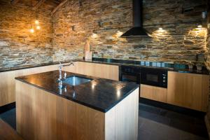 Una cocina o zona de cocina en Aldea Rural y Gastro Restaurante Casona de Labrada