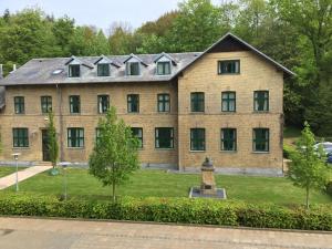 Aed väljaspool majutusasutust Hotel Vejlefjord