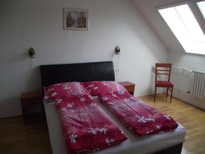 Postel nebo postele na pokoji v ubytování Apartman Kaszás City
