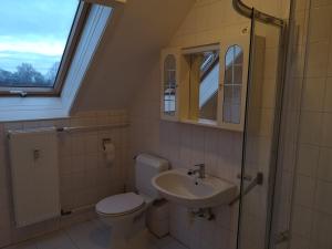 Koupelna v ubytování Apartman Kaszás City + 8 fotografií