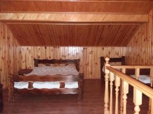 Säng eller sängar i ett rum på Hotel Dudarik