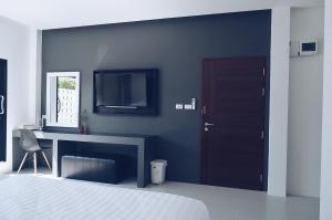 Et tv og/eller underholdning på Wannachart Boutique Resort