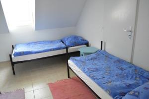 Postelja oz. postelje v sobi nastanitve Stará Fara